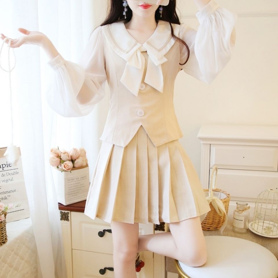 Bộ áo voan phối chân váy xếp ly đáng yêu cho nữ