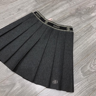 Chân váy li cạp gu-ci