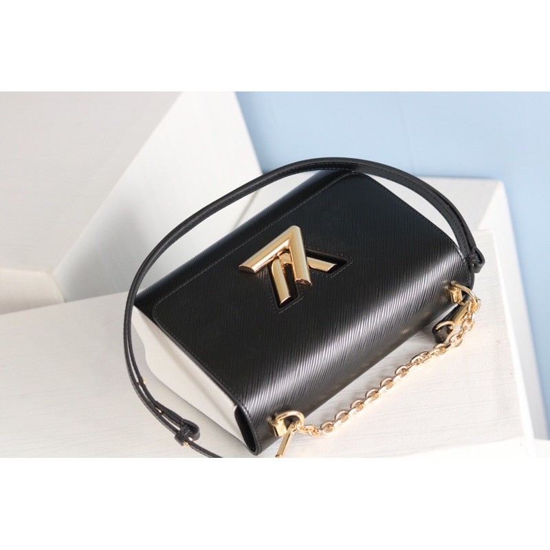 Túi xách tay nữ phom cứng có dây đeo khoá logo chữ một ngăn to louis vuitton Lv