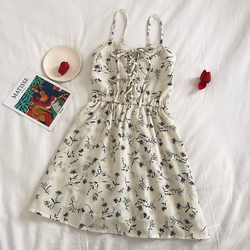 Jumpsuit hai dây hoa nhí sẵn màu sữa | BigBuy360 - bigbuy360.vn