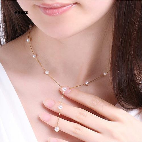 Bộ vòng cổ , vòng tay , khuyên tai đính hạt ngọc trai