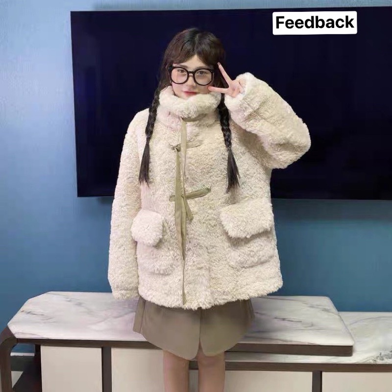 Áo khoác lông cổ cao phom dài qua mông thắt nơ tiểu thư