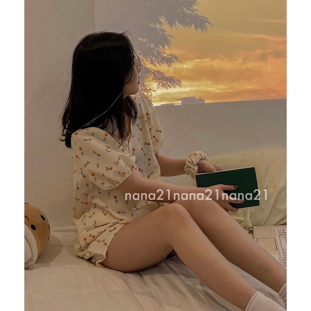 Bộ đồ chất xốp cổ tròn phối cúc dọc ngực
