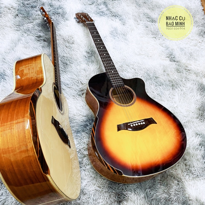 Đàn guitar acoustic full gỗ(lưng gỗ Koa) có bavel chống cấn tay. Tặng kèm full phụ kiện
