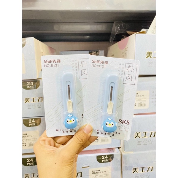 Dao rọc giấy hươu cao cổ tiện lợi