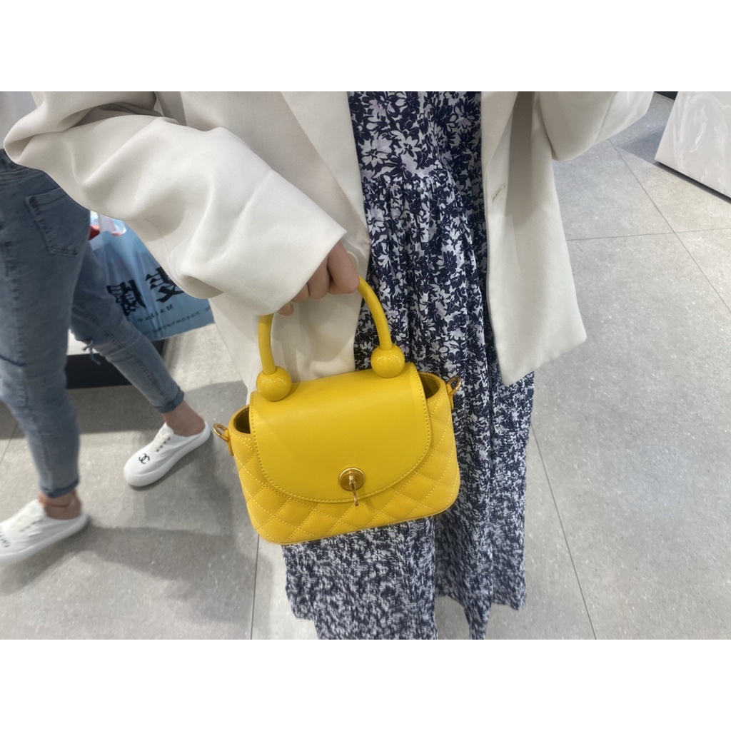 Charles and Keith Lingge túi xách khóa túi đi lại phụ nữ túi sling túi vai