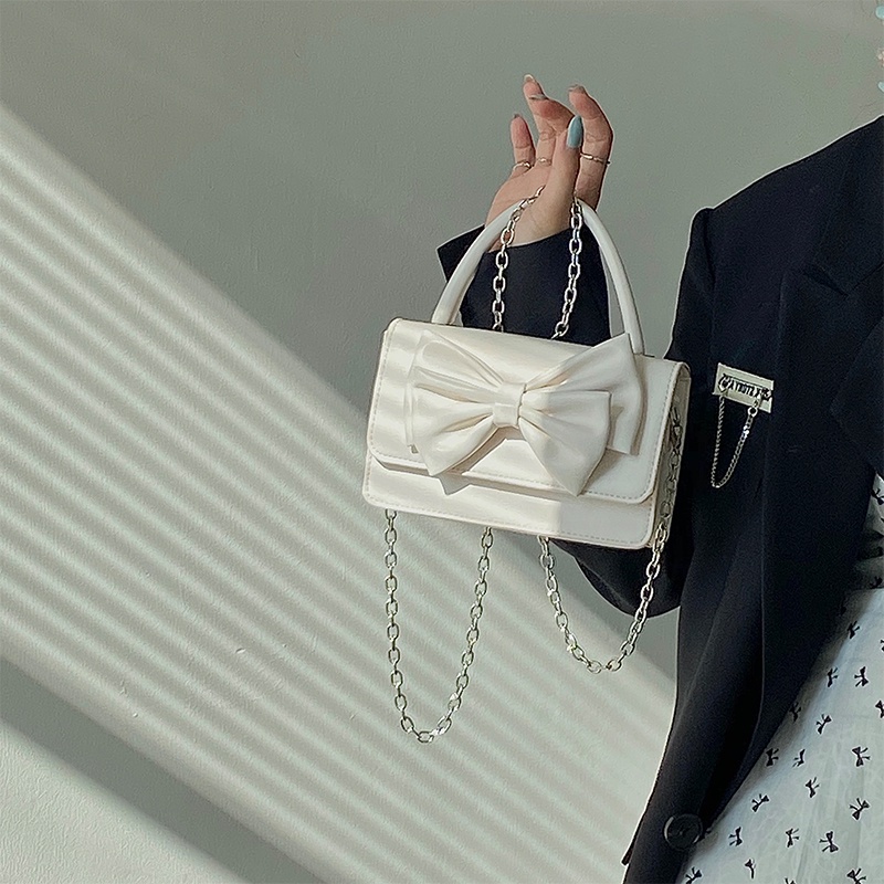 Túi Đeo Chéo Hình Vuông Nhỏ Đính Nơ Phối Dây Đeo Sợi Xích Thời Trang Cho Nữ