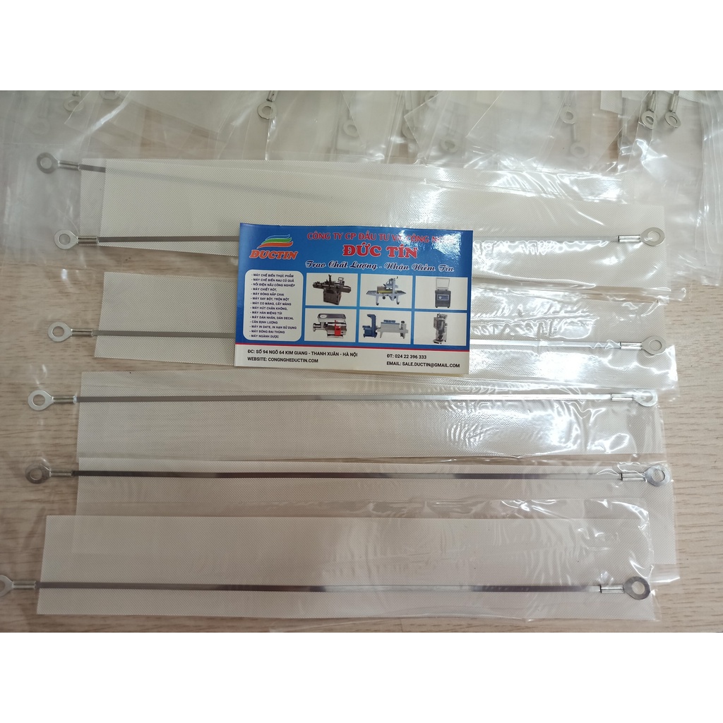 Dây hàn máy hàn miệng túi dập tay Đức Tín dùng để ép nhiệt túi nilon, túi bóng, có 1 dây sắt và 1 lớp vải chịu nhiệt