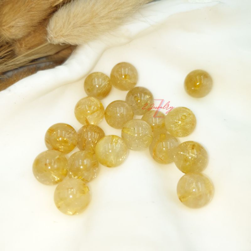 1 hạt đá tóc màu vàng