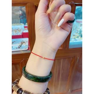 Vòng tay chỉ đỏ bi vàng