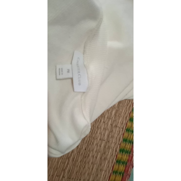 Aó thun unisex tay dài phom rộng màu trắng kem .
