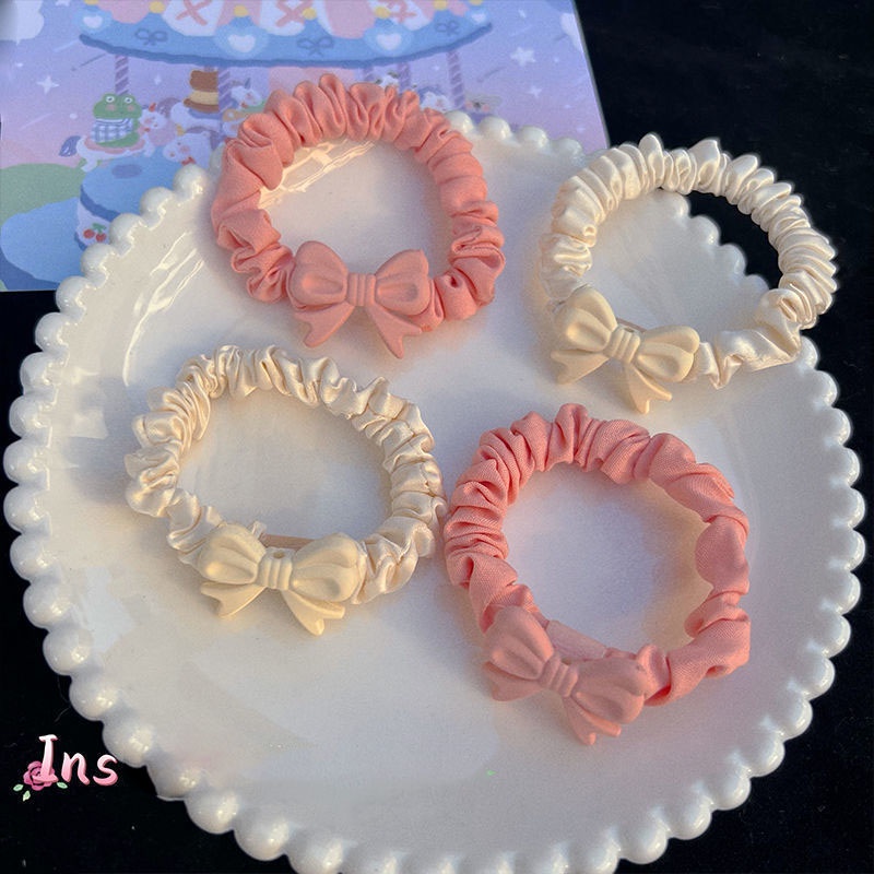 Dây Cột Tóc Màu Trơn Co Giãn Tốt Đính Nơ Hồng Dễ Thương Phong Cách Hàn Quốc Cho Nữ