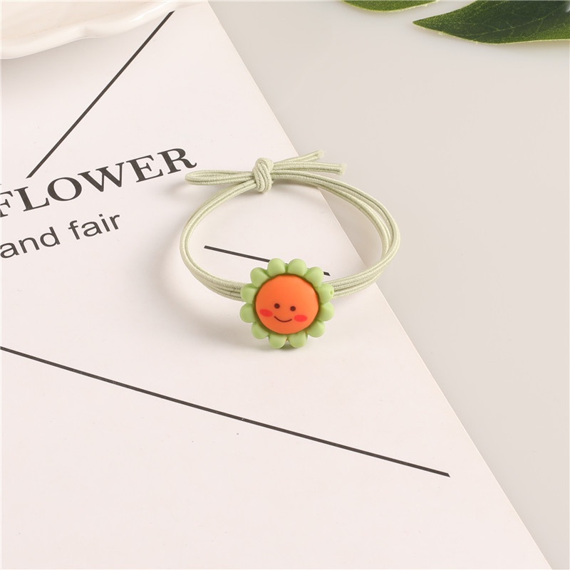 Dây buộc tóc hoa mặt cười xinh xắn  Clovershop68