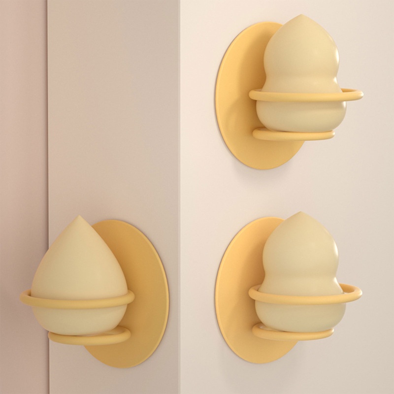 Giá Đỡ Mút Trang Điểm Gắn Tường Hình Quả Trứng Tiện Lợi