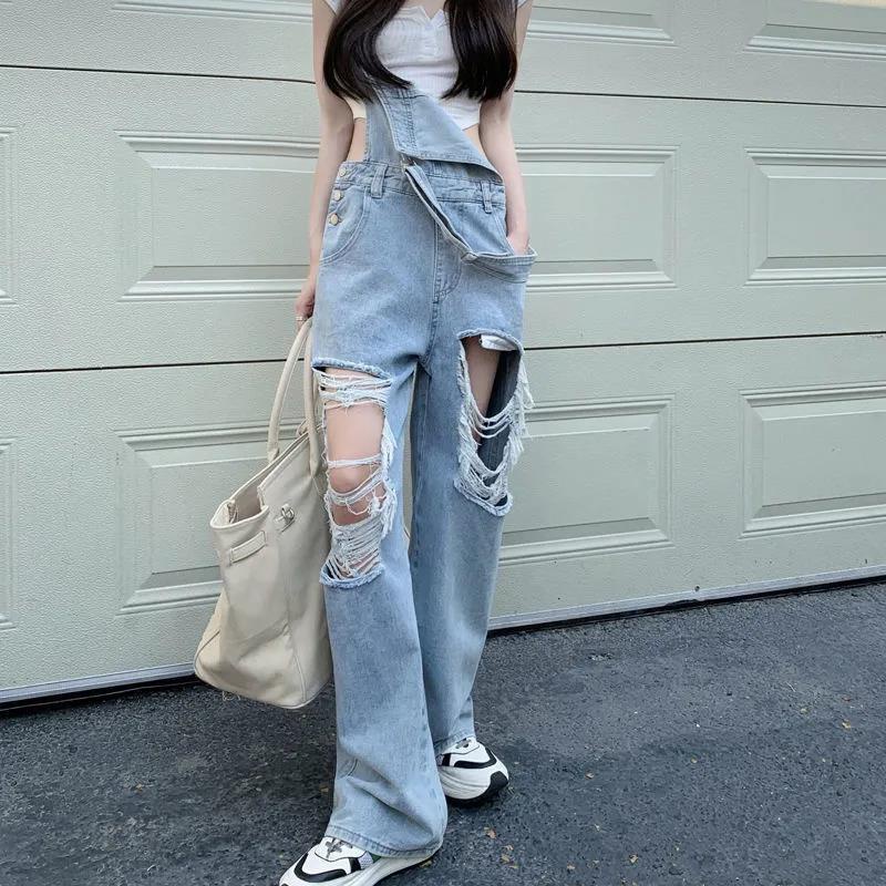 Quần yếm jean dáng rộng thiết kế rách lỗ dễ phối đồ phong cách mới thời trang dành cho nữ