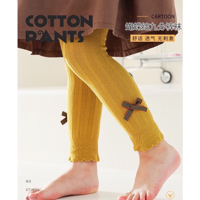 Quần tất đính nơ cho bé gái hàng qc