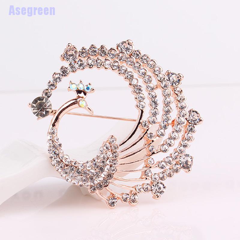 Trâm cài áo hình chú công đính đá pha lê thời trang dành cho nữ