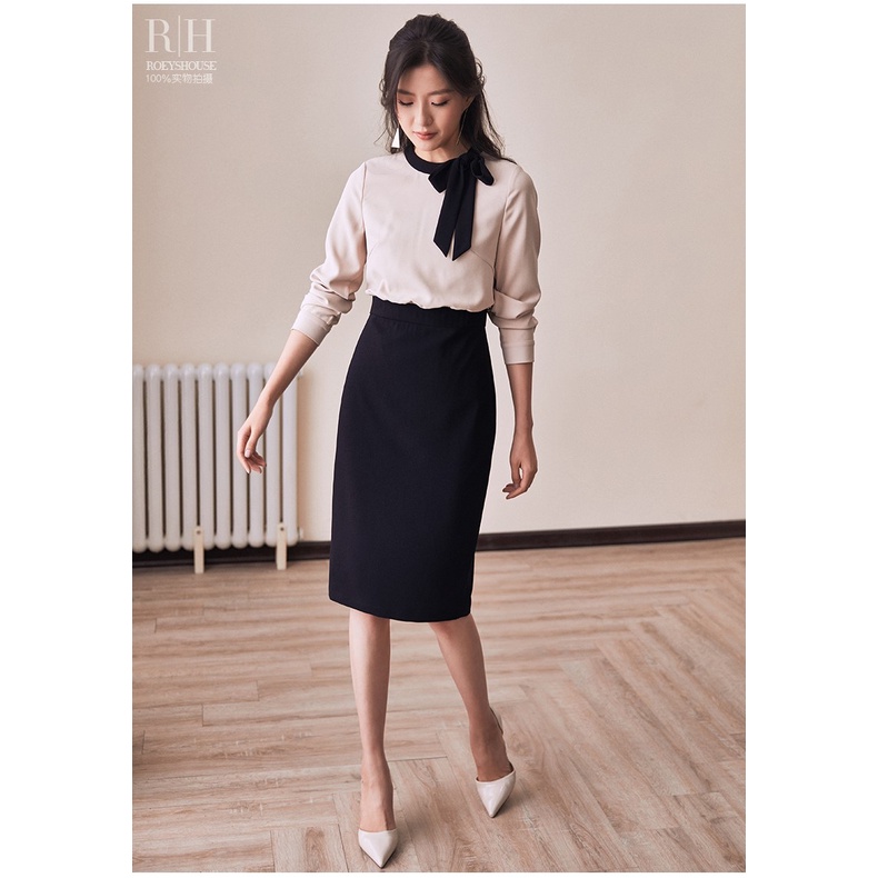 Đầm đen bút chì trên cổ tròn nơ cột cỏ đen tay dài công sở