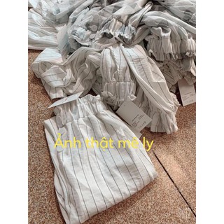 quần kẻ cạp cúc bọc