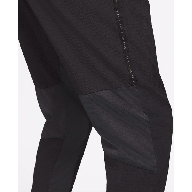 Quần nike running division