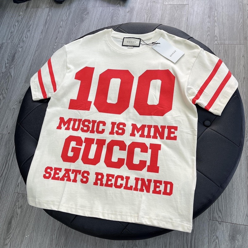 Áo Tee Gu*cci 100 Music Is Mine Màu Off-White