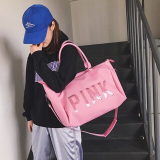 Túi pink kim sa du lịch