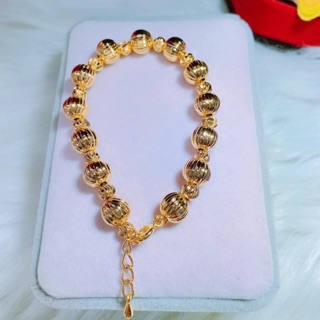 Lắc bi mạ vàng