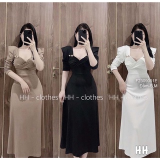 Đầm kiểu xòe xoắn ngực đính khuy balen hai bên có đệm vai tay bồng!