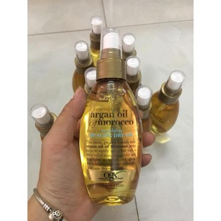 Xịt dưỡng tóc OGX Argan Oil Of Morocco chiết xuất tinh dầu Argan Oil Ma-rốc - Ngọc Lan