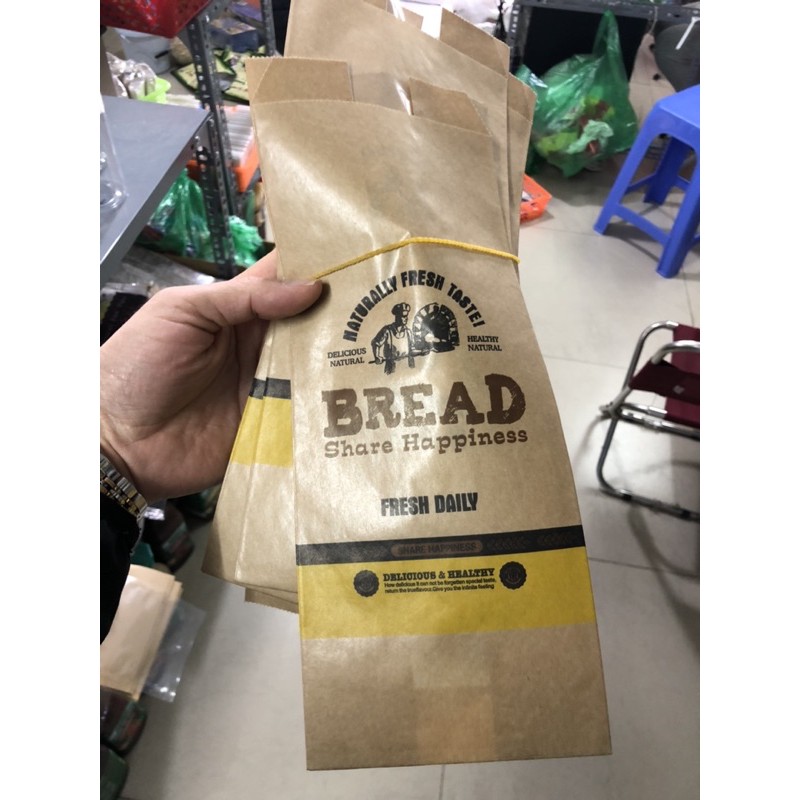 bịch 50 cái Túi đựng bánh mì Hoa Cúc dọc bread màu nâu kt 12x31cm bánh 250-350g
