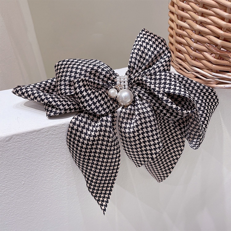 Kẹp tóc hình hơ đính ngọc trai giả xinh xắn cho nữ