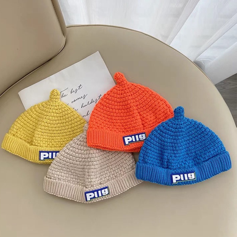 Mũ Beanie Dệt Kim Mềm Mại Màu Trơn In Chữ Giữ Ấm Mùa Đông Cho Bé