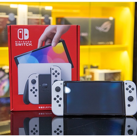 Đồ chơi máy chơi game cầm tay online gaming chơi game giá rẻ điện tử cao cấp hiện đại loại Nintendo Switch OLED White (T