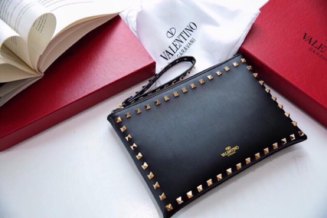 Cluth Valentino cầm tay