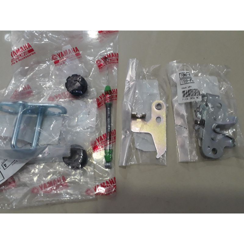 Bộ bướm khóa yên.bát móc khóa yên.bát khoá yên và dây mở yên xe Exciter 2006-2010 Yamaha