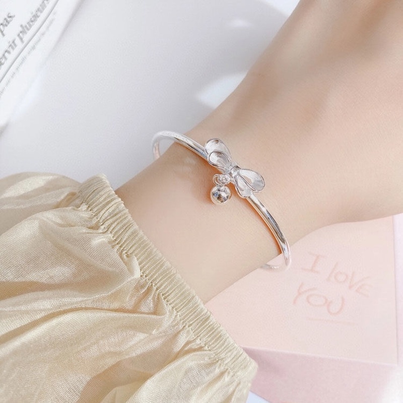 Vòng Đeo Tay Màu Bạc Đính Chuông Nhỏ Có Thể Điều Chỉnh Cho Nữ