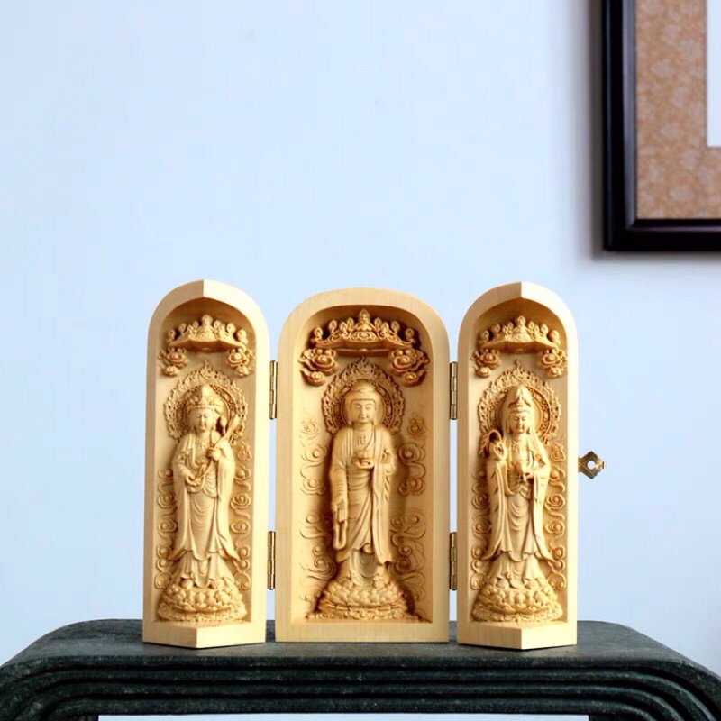 Bộ tượng gỗ: Tây Phương Tam Thánh gấp gọn thông minh được chế tác tinh xảo, mang lại ý nghĩa may mắn và an lành.