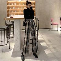 Quần dạ ống rộng trắng đen