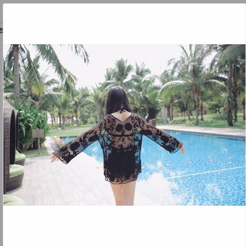Spot sale white hollow loose see-through lace beach jacket mid-length long-sleeved sunscreen sexy swimsuit blouse single top