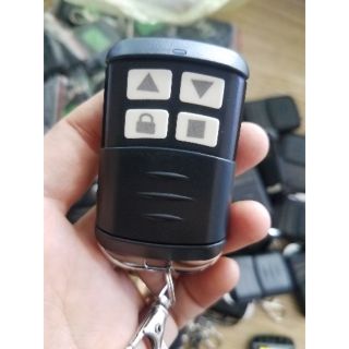 Điều khiển cửa cuốn chống nước, mã gạt, tần số 433mhz