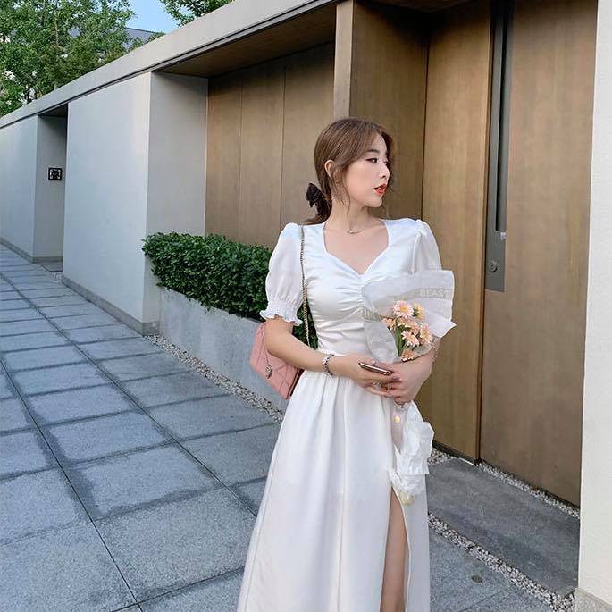 Đầm maxi trắng xẻ tà nhún ngực siêu xinh