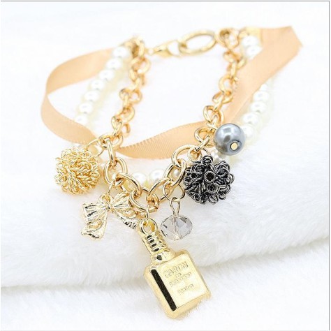 Vòng tay hạt châu nơ cung pha lê màu vang duyên dáng