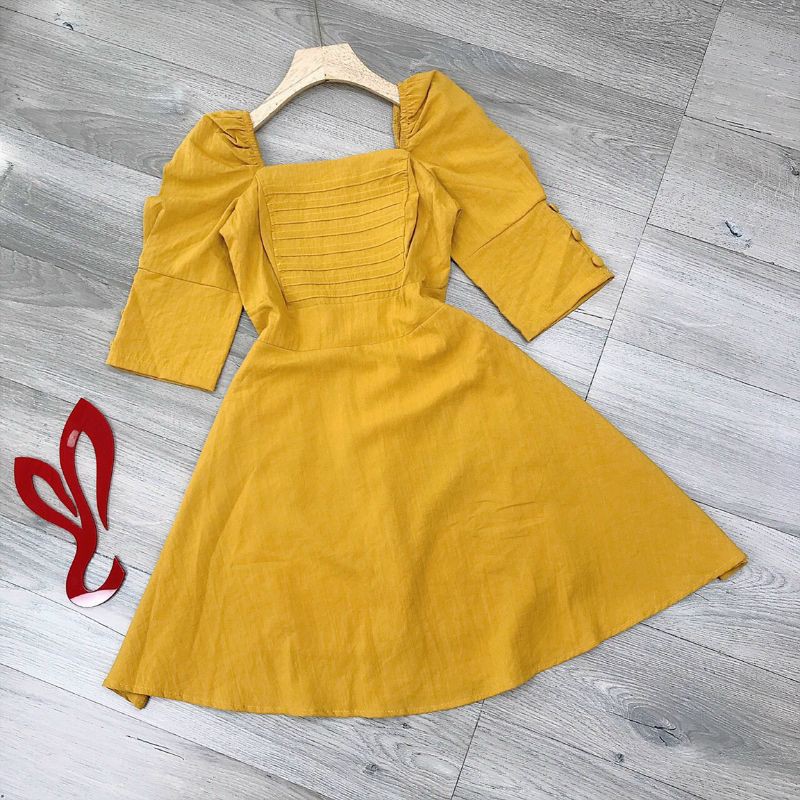 Đầm nút bọc tay phồng xép ly ngực mocking