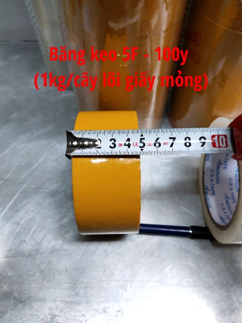 Băng keo 5F -100y (siêu dính 1kg/cây 6 cuộn) giá 1 cuộn.