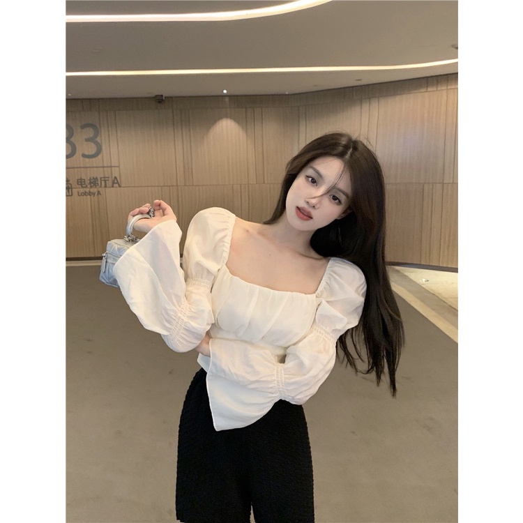 Áo tơ tay phồng rúm ngực thiết kế thắt nơ lưng sang chảnh, điệu đà