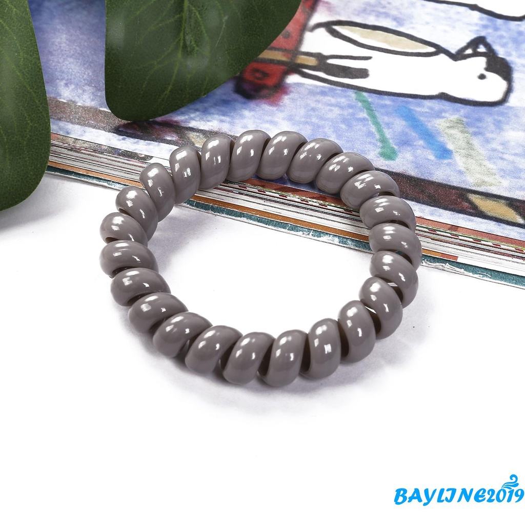 Dây buộc tóc co giãn màu trơn xoắn ốc không để lại dấu vết cho nữ