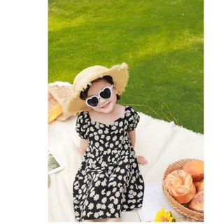 Váy hoa cúc cho bé