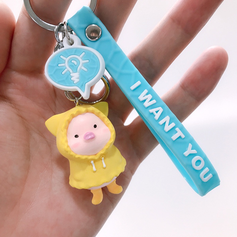 Hoạt Hình Móc Khóa Nhựa Hình Chú Heo Mặc Áo Mưa Dễ Thương