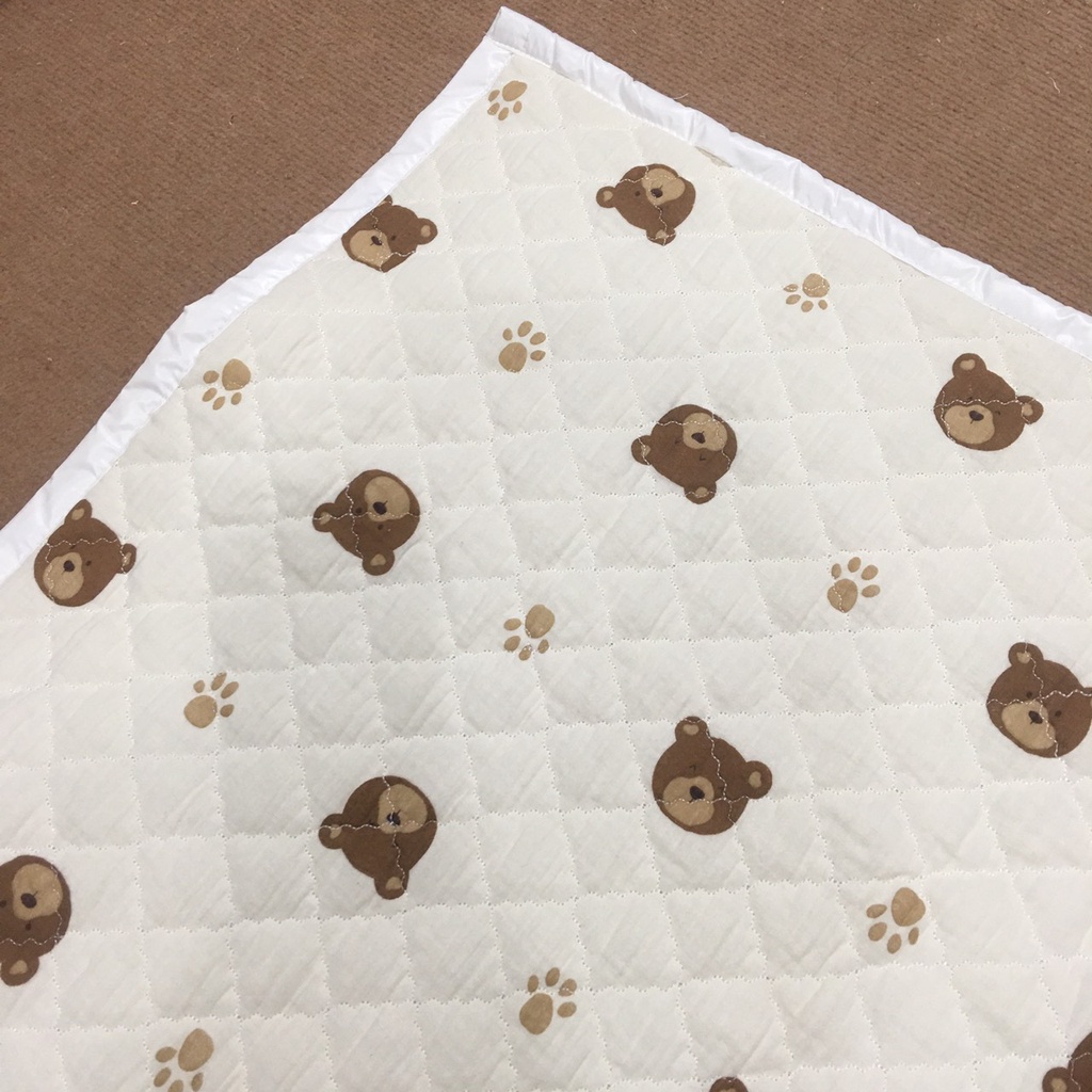 Nệm trần bông chống thấm gấu Be 65x100cm trải giường- cũi cho bé