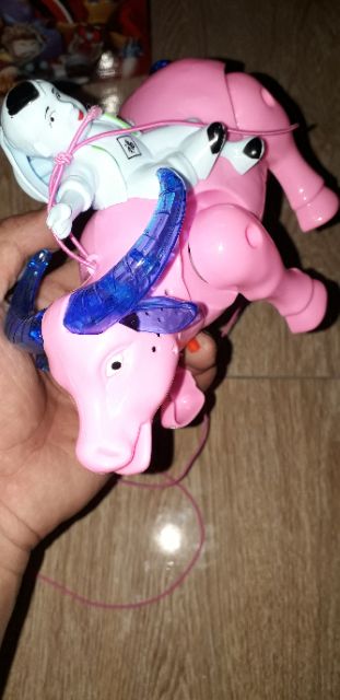 Một mô hình chú bé chăn trâu bằng nhựa có nhạc và đèn Led rất đẹp _tặng kèm pin